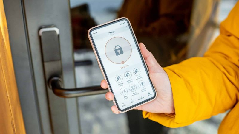 Locking entrance door with a smart phone